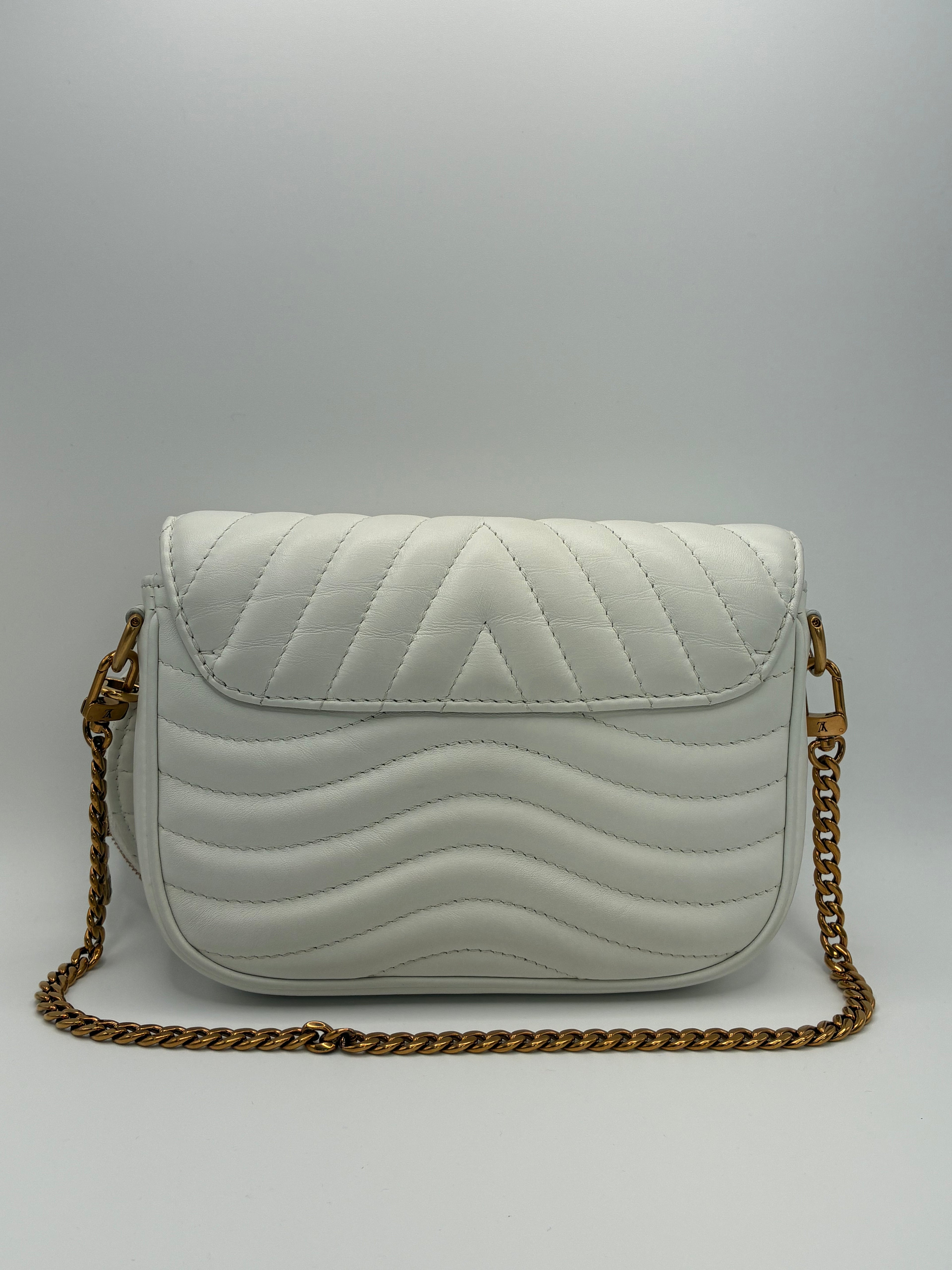 Louis Vuitton Calfskin New Wave Multi Pochette in white quilted leather