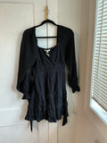 Francesca’s black dress