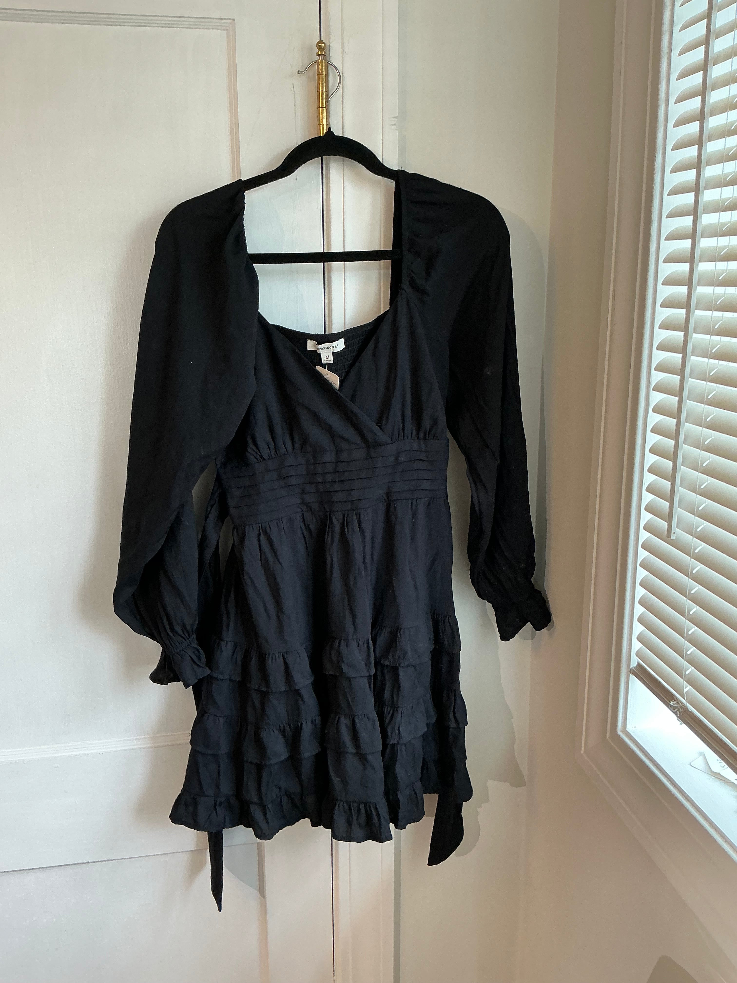 Francesca’s black dress