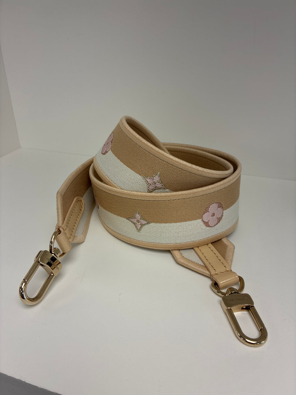 Pink tan guitar strap