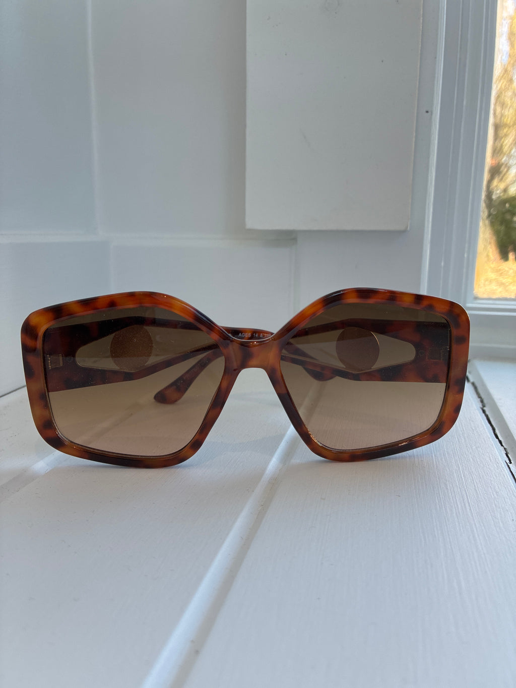 Oversized turtle shell sunglasses