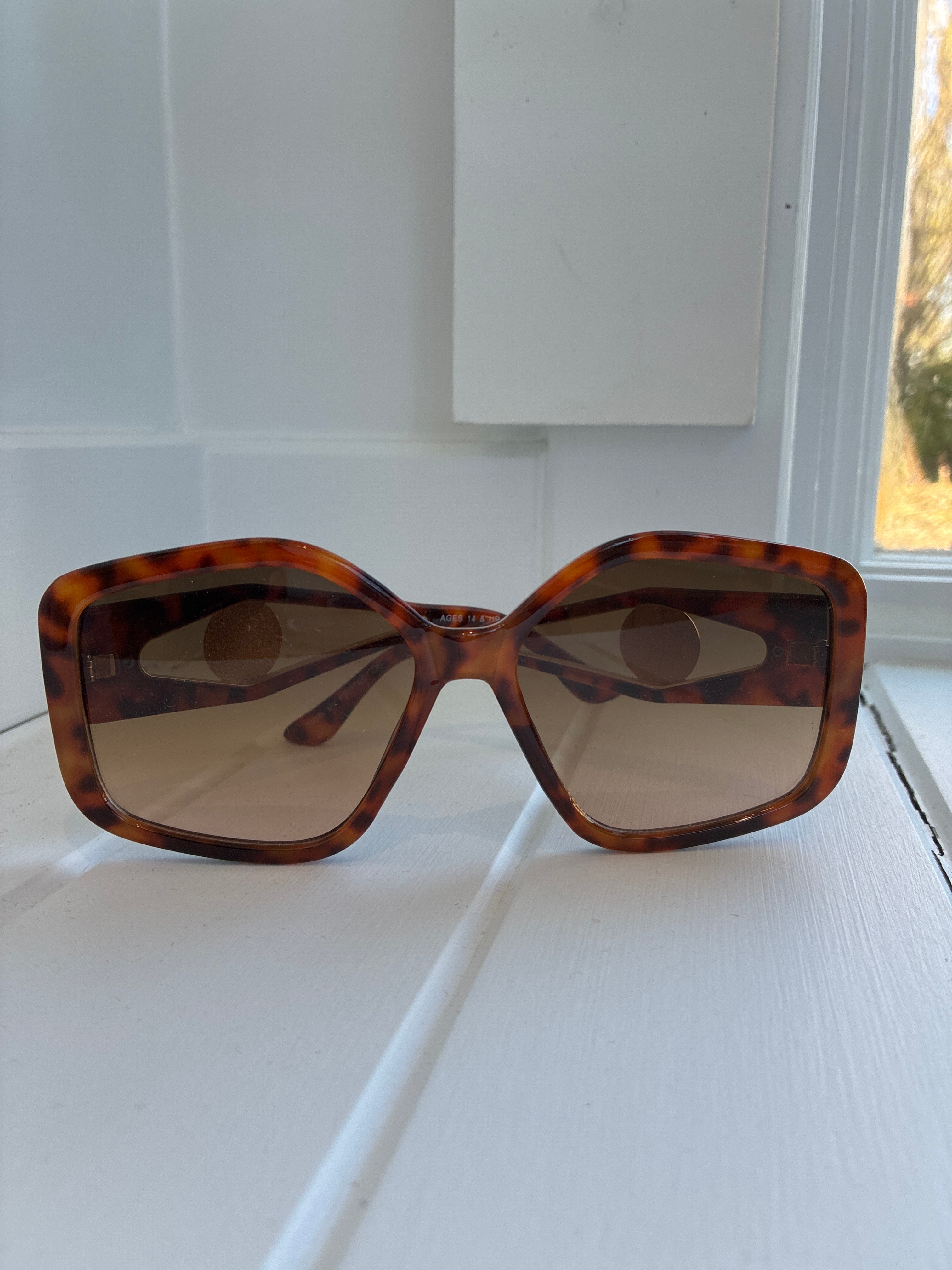 Oversized turtle shell sunglasses
