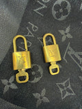 Louis Vuitton gold lock and key