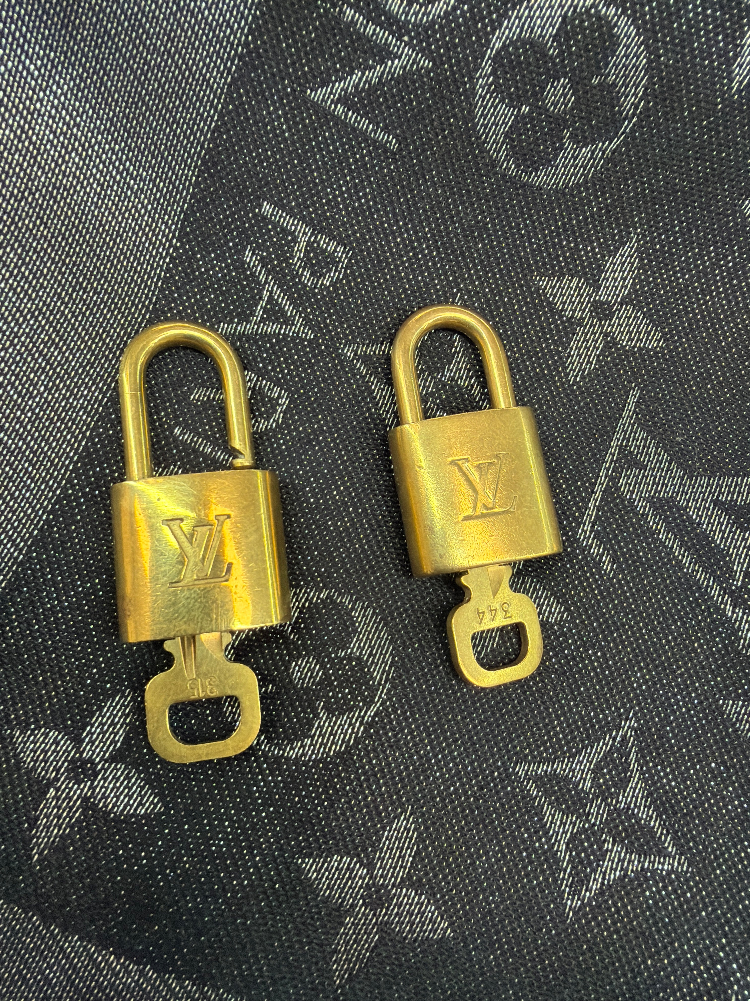 Louis Vuitton gold lock and key