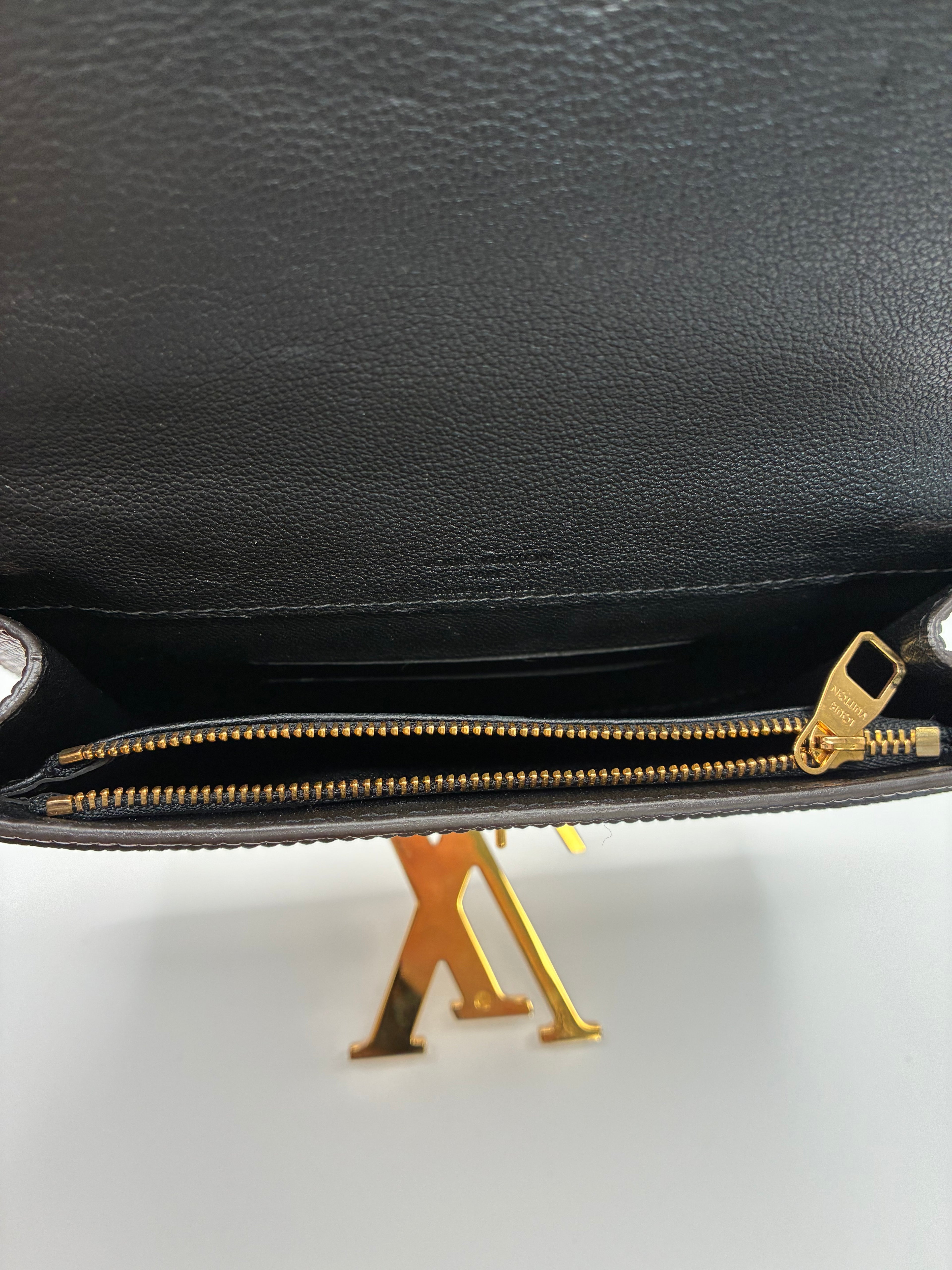 Louis Vuitton Lizard Clutch