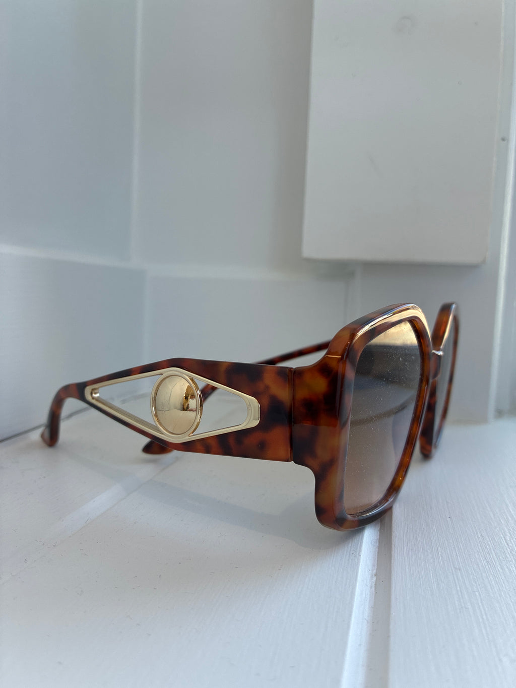 Oversized turtle shell sunglasses