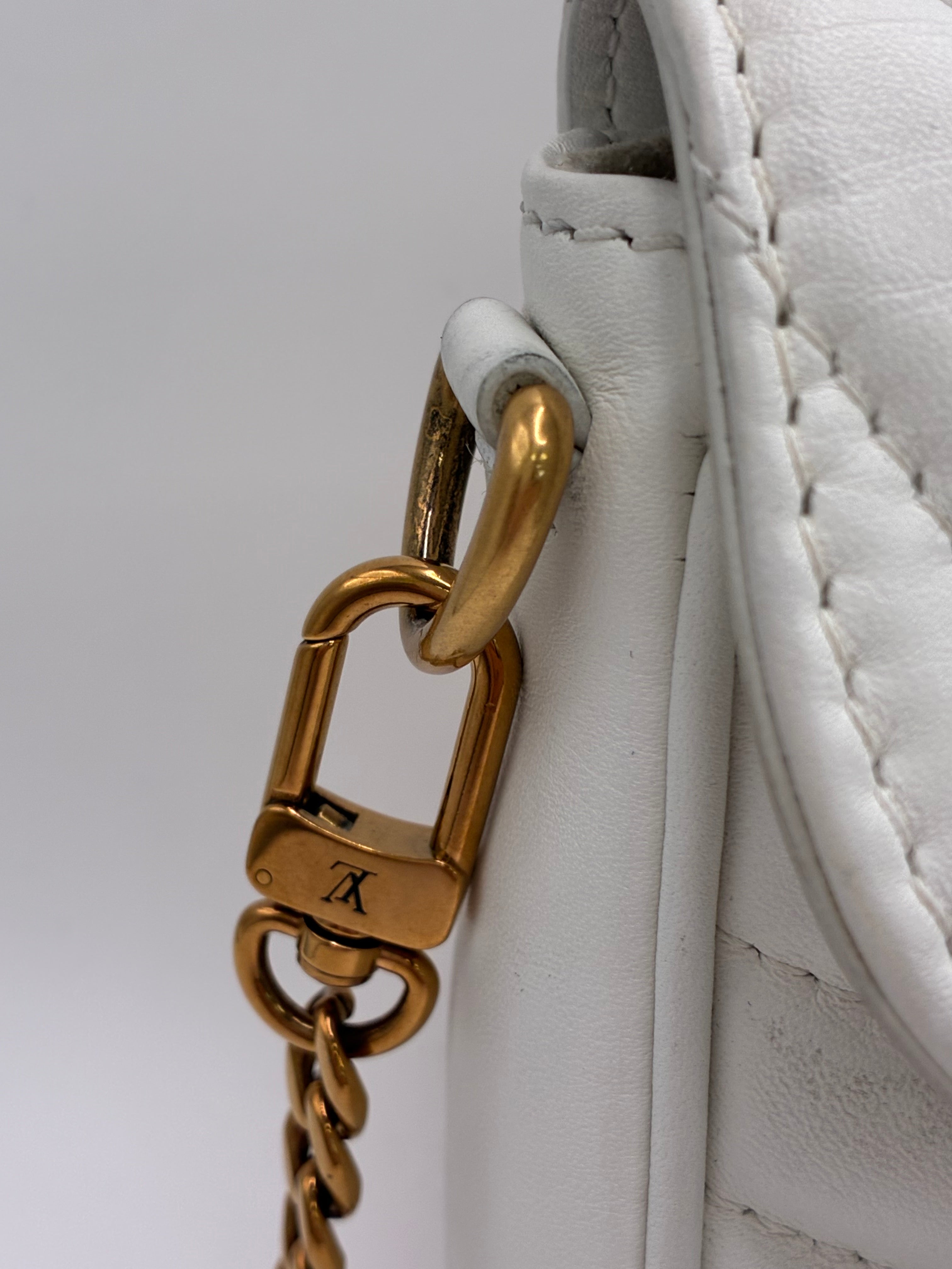 Louis Vuitton Calfskin New Wave Multi Pochette in white quilted leather